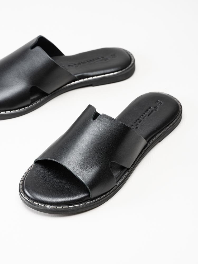 Tamaris - Svarta slip in sandaler med silverfärgad söm