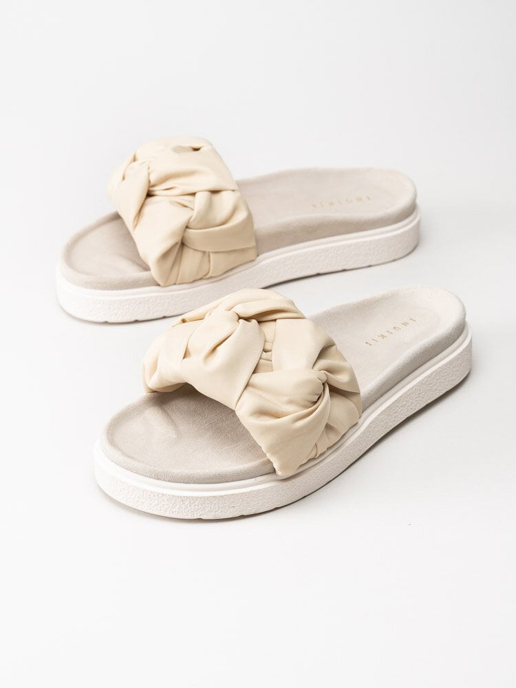 Inuikii - Fjord Flower - Beige slip in sandaler med flätad design