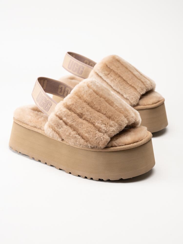 UGG - W Disco Sherpa Corduroy Slide - Ljusbruna tofflor med platå