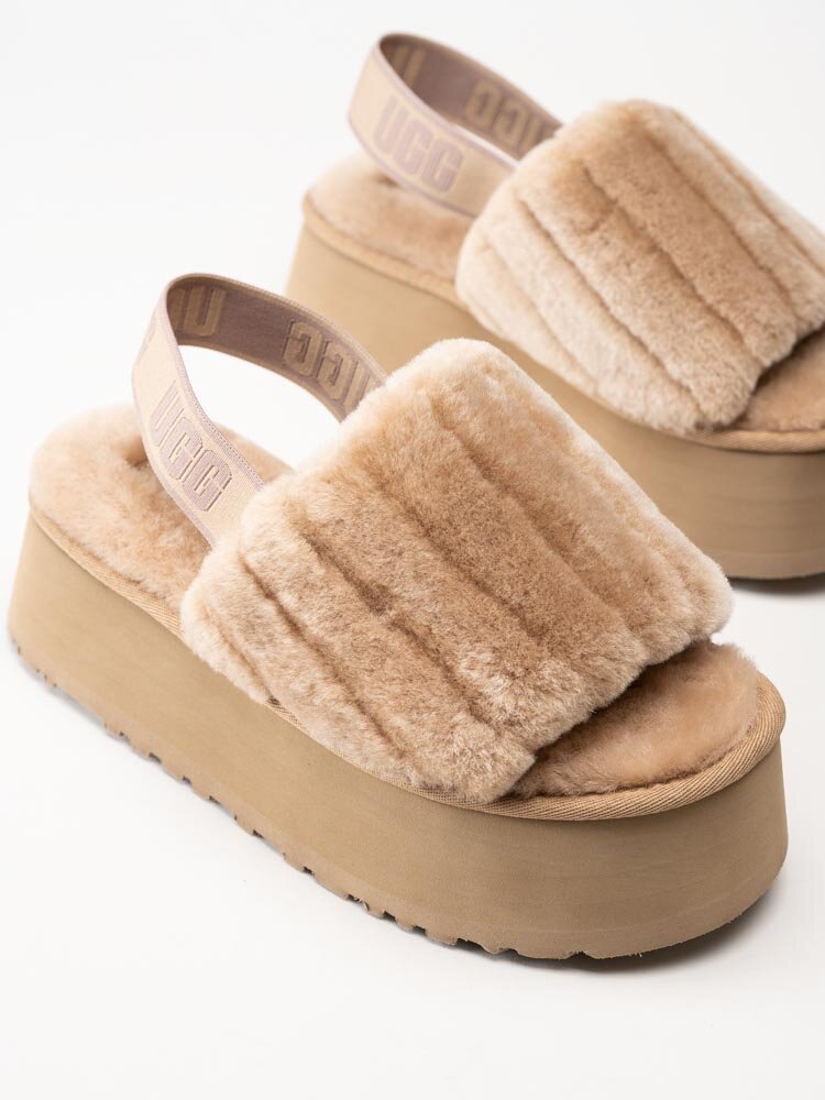 UGG - W Disco Sherpa Corduroy Slide - Ljusbruna tofflor med platå