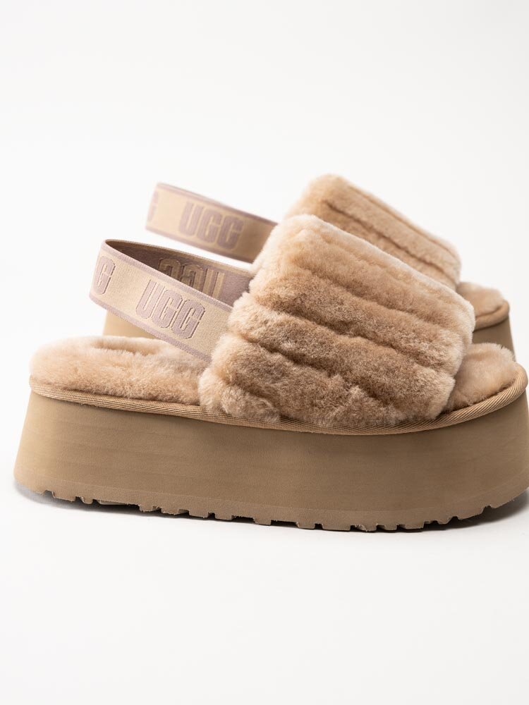 UGG - W Disco Sherpa Corduroy Slide - Ljusbruna tofflor med platå