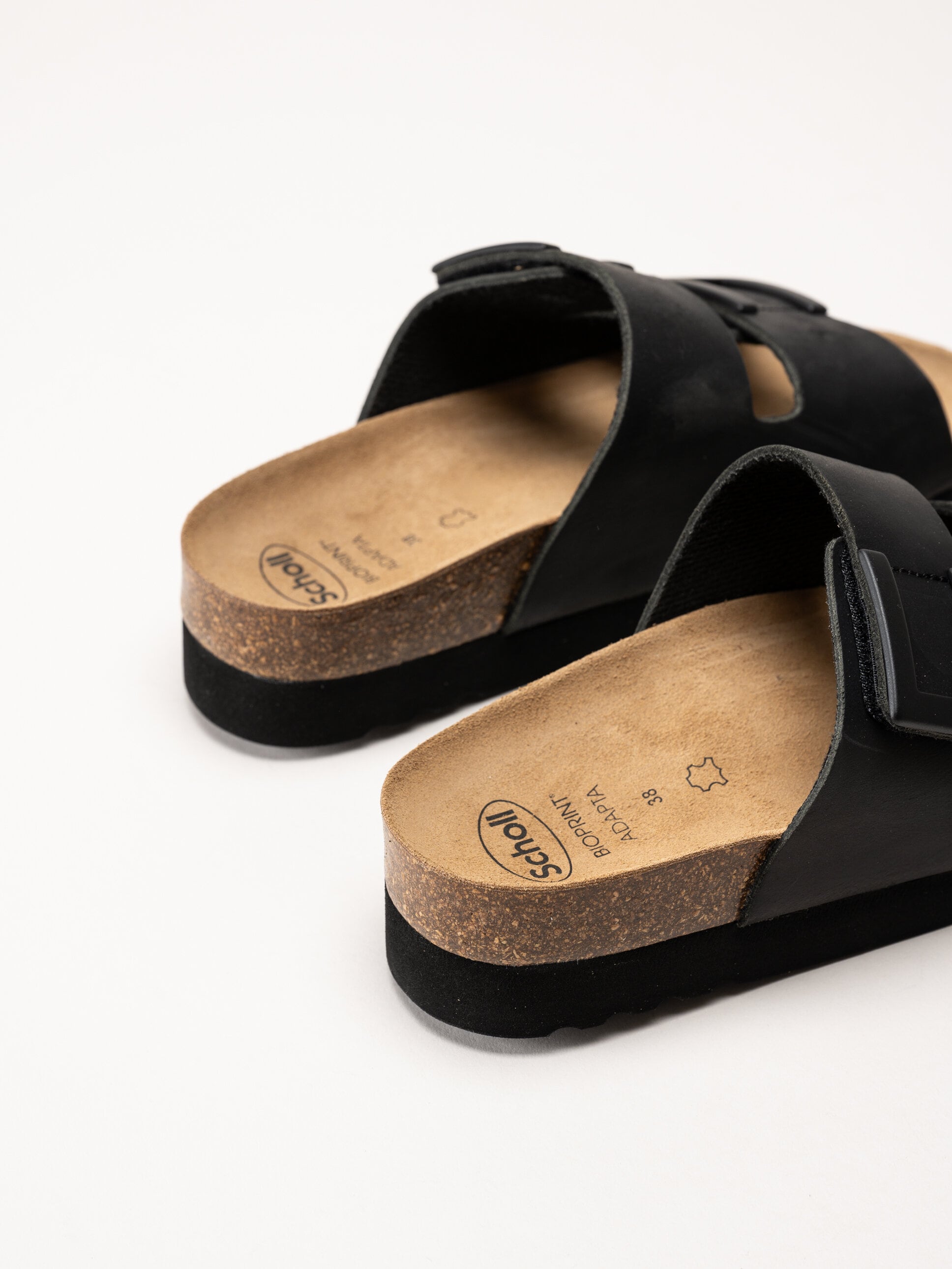 Scholl - Monterey 2 Straps - Svarta slip in sandaler i oljat skinn
